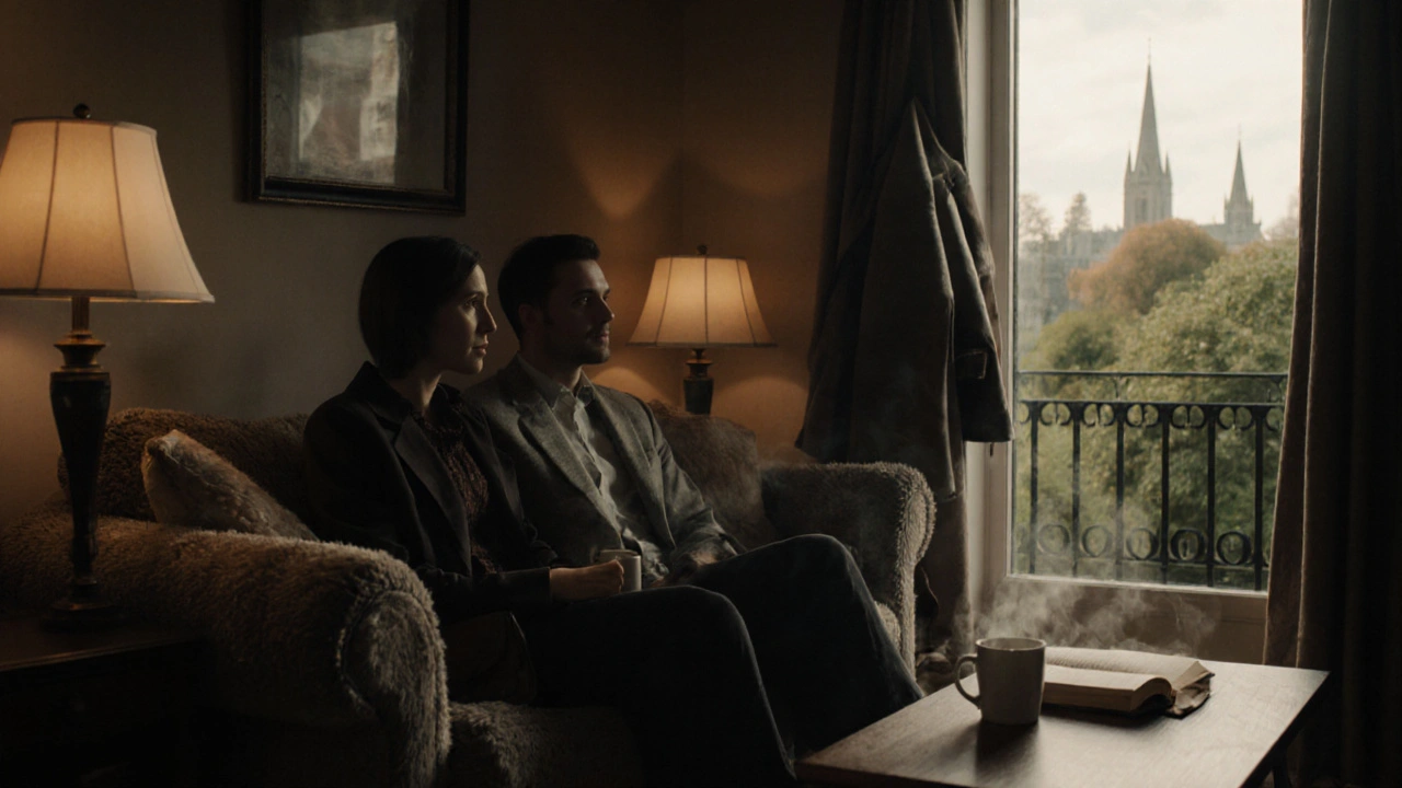 Two people sit quietly together on a sofa in a cozy Hounslow apartment, sharing a warm drink and an open book.